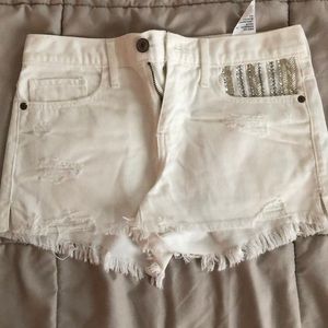 Abercrombie and Fitch white jean shorts.